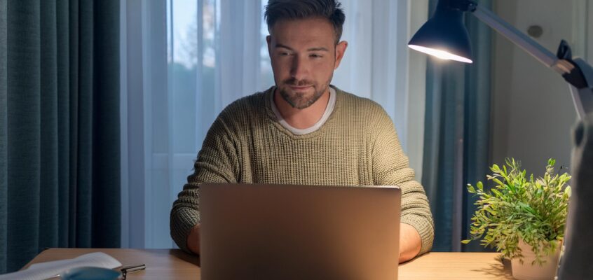 man working remotely from home