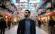 man walking in a shopping mall