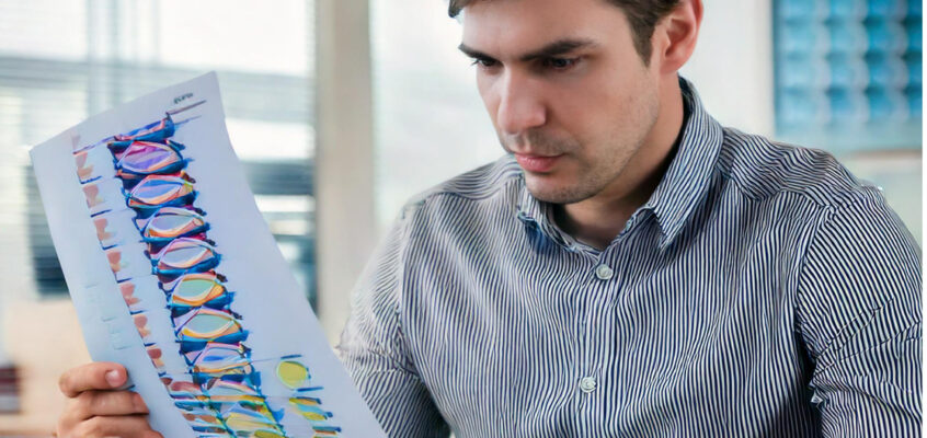 man reading genetics report landscape